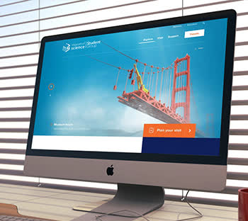 Blue theme. Mac desktop image. Web design & development mockup. Interactive features. Sky & Bridge. Online web solutions.
